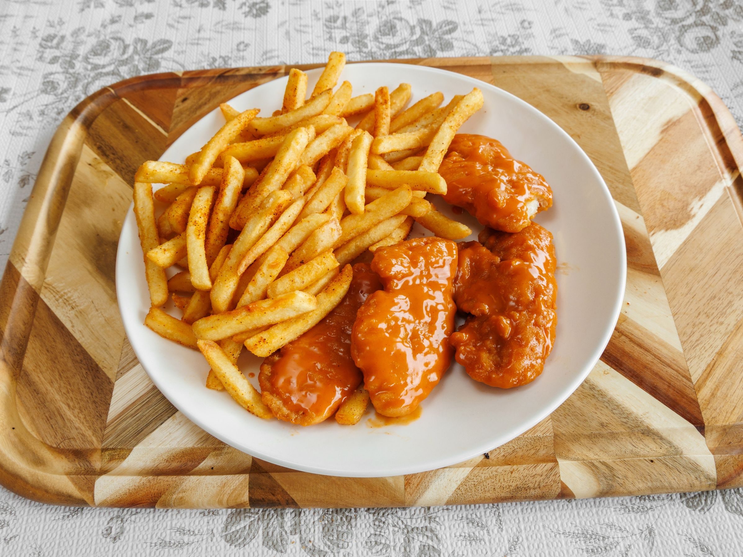 Buffalo Chicken Tenders with Fries.