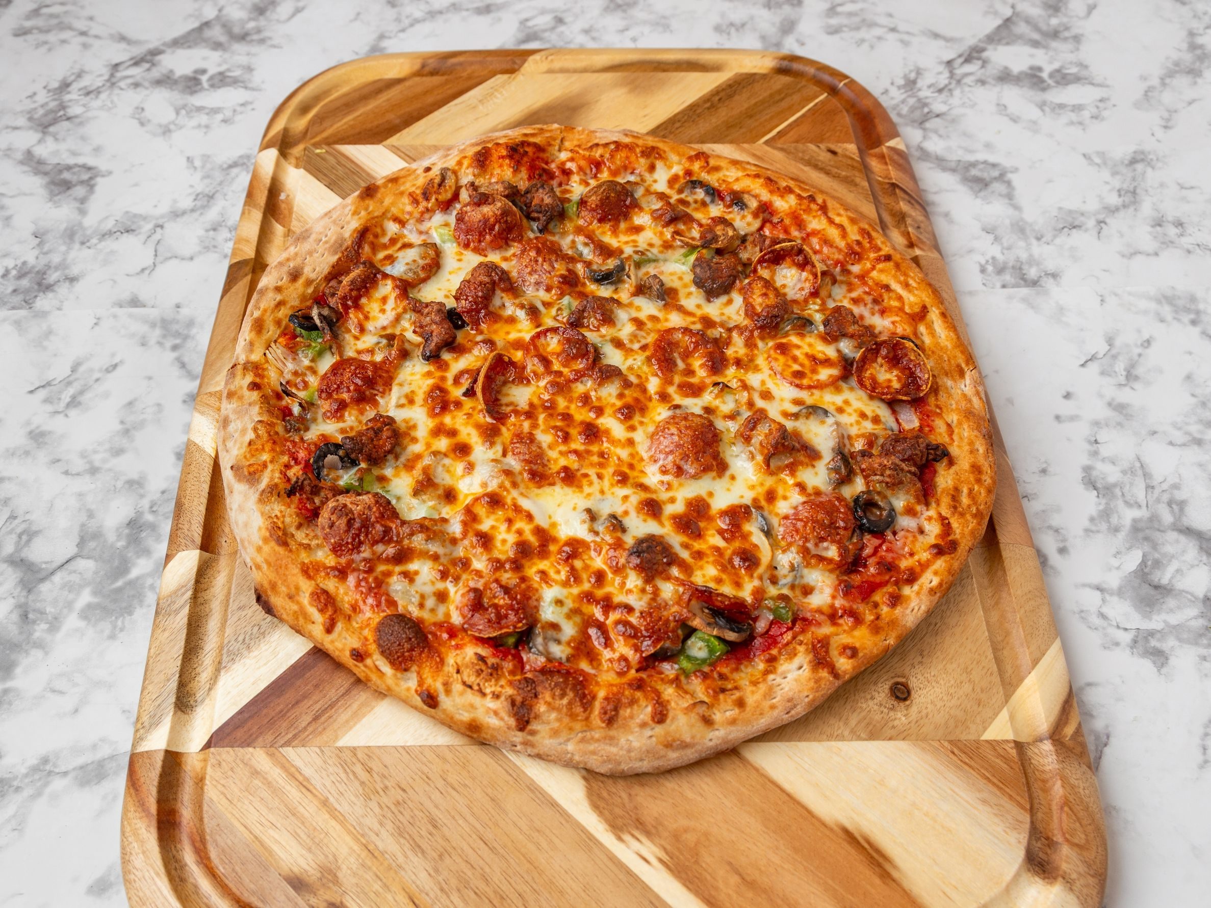 Supremo Pizza.